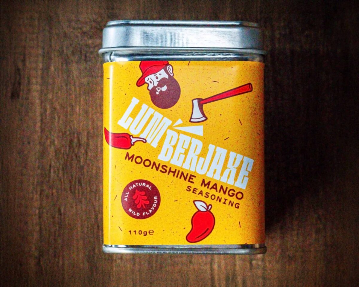 Tin of Lumberjaxe moonshine mango seasoning
