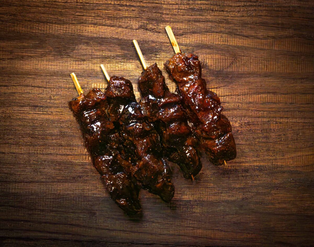 Black garlic and pepper marinated rump steak kebabs