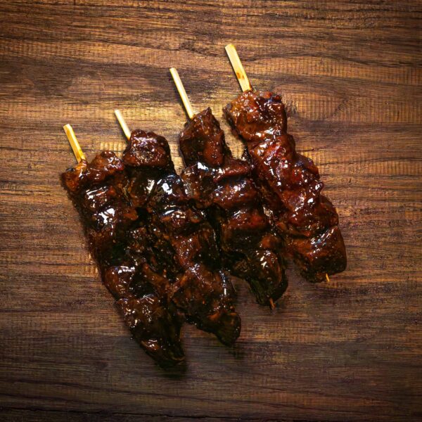 Black garlic and pepper marinated rump steak kebabs